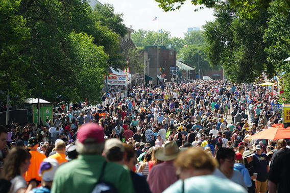 Crowds of people walking through the MN State Fair